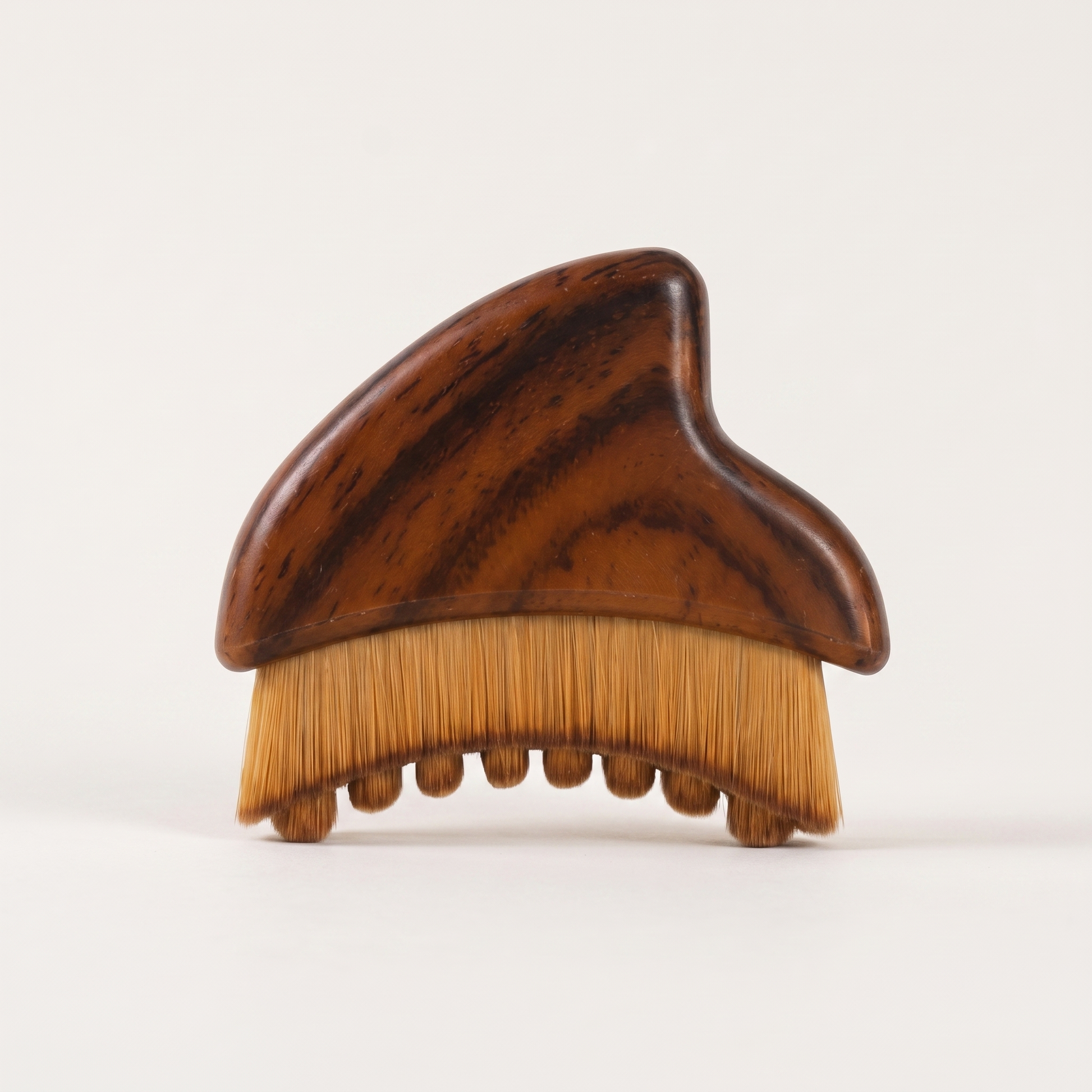 Facial brush on a light neutral background